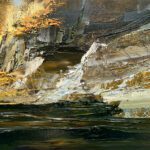 Scenic waterfall among autumn foliage