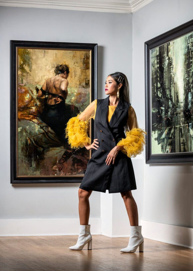 Fashionable pose in art gallery setting