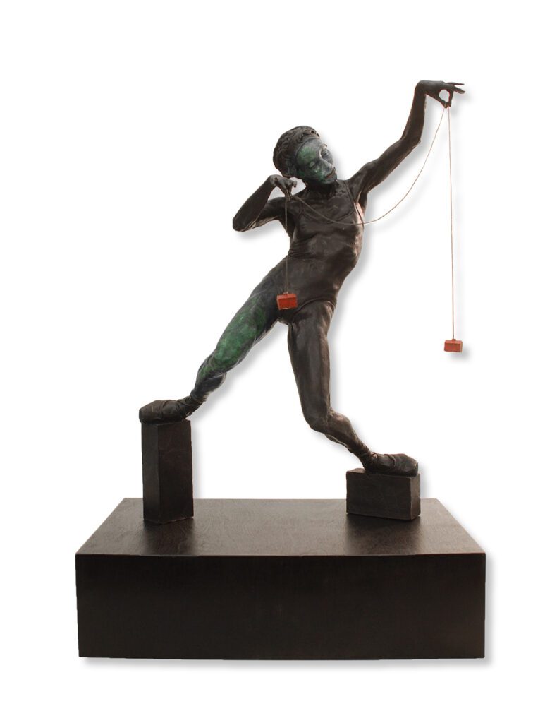 Artistic statue with a balancing pose