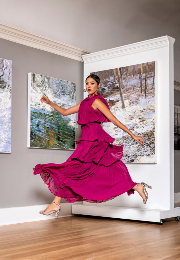 Elegant pose in vibrant magenta gown