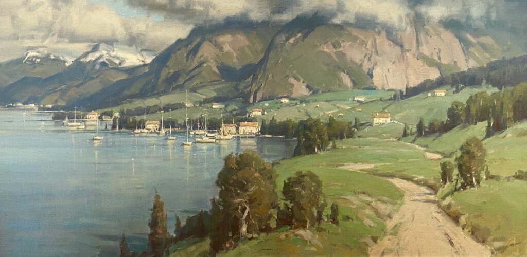 Peaceful lakeside view with mountains and greenery