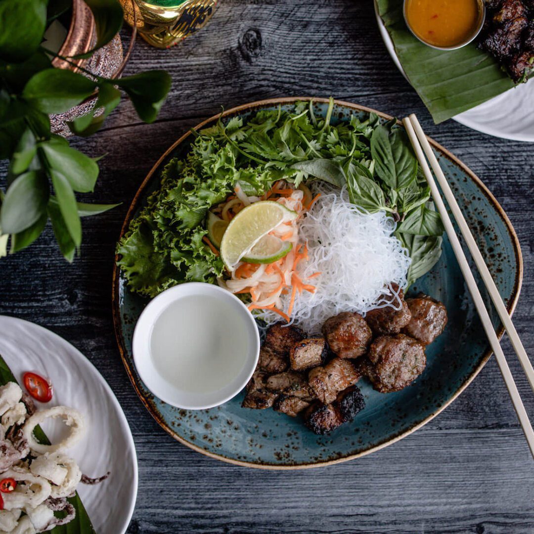 Asian cuisine with chopsticks and sauce