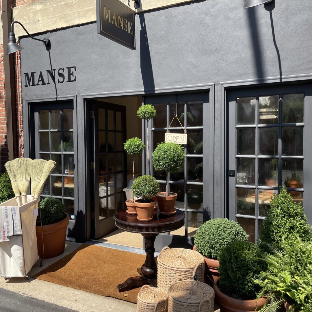 Cozy store facade with greenery
