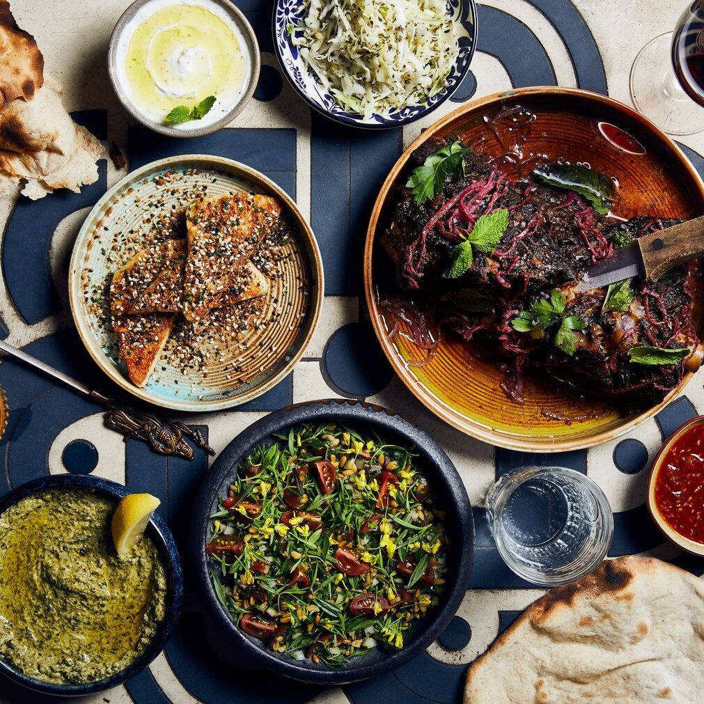 Assorted Mediterranean dishes on patterned table