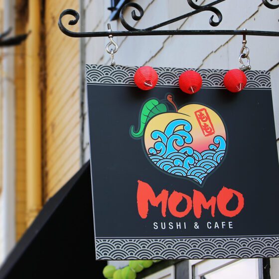Momo sushi cafe sign with lanterns