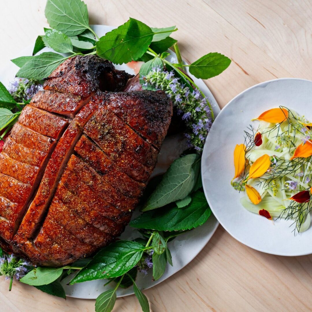 Grilled meat with leafy herb presentation