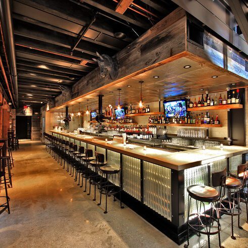 Sleek bar interior with wooden accents
